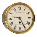 Brass cased ship's bulkhead single train clock, the 7" cream dial signed Atkinson & Co.