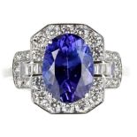 Good 18ct oval tanzanite and diamond dress cluster ring, intense deep purple AAA tanzanite 3.38ct