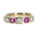 18ct yellow gold ruby and diamond five stone gypsy style band ring, Birmingham 1953, with two oval