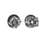Pair of modern 18ct white gold diamond stud earrings, round brilliant-cut, 0.86ct approx, clarity