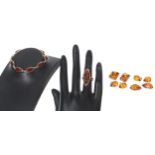 Selection of modern 9ct amber set jewellery to include a bracelet, ring and four pairs of