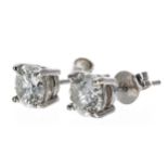 Good pair 18ct white gold diamond solitaire stud earrings, each 0.85ct approx, clarity SI, colour