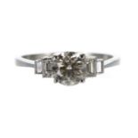 Platinum diamond solitaire ring with baguette diamond shoulders, then centre diamond 0.90ct
