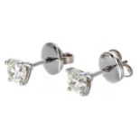 Pair 18ct white gold four claw round brilliant-cut diamond solitaire stud earrings, 1.04ct approx in