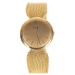 Piaget 18ct dress wristwatch, circular champagne dial with applied baton markers, signed cal. 9P
