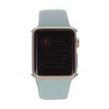 Apple watch with a pale blue strap, 36mm x 42mm