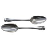 Pair of George I Hanoverian rat tail pattern silver table spoons, each engraved with a knight crest,