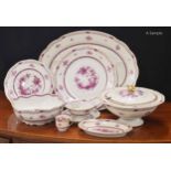Theodore Haviland, Limoges, France extensive dinner service, decorated with a central pink basket of