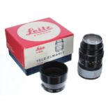 Leica  Tele-Elmarit 90mm f2.8 long focal length camera lens, no. 2490595, in black with hood,
