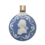 Wedgwood Jasperware scent bottle, of circular flask form, decorated with the profile bust of The