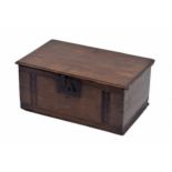 Antique oak bible box, the moulded hinged cover over geometric carved front, with cast iron hinges