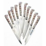 Attractive set of ten porcelain handled fruit knives, with foliate and gilded pistol grips and