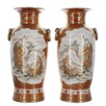 Pair of large Japanese Kutani porcelain vases, decorated with warrior figural panels within gilt