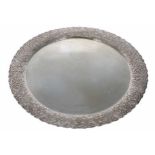 Large Greek white metal (900) circular serving tray, with a stylised arabesque embossed wide rim,