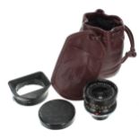 Leica Super-Angulon 21mm f3.4 camera lens, no. 2292779, in black, with lens hood 12501 and Leica