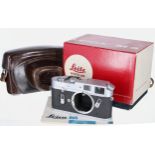 Leica M4 silver body 1183480, boxed with instruction booklet; also a brown leather Leica branded