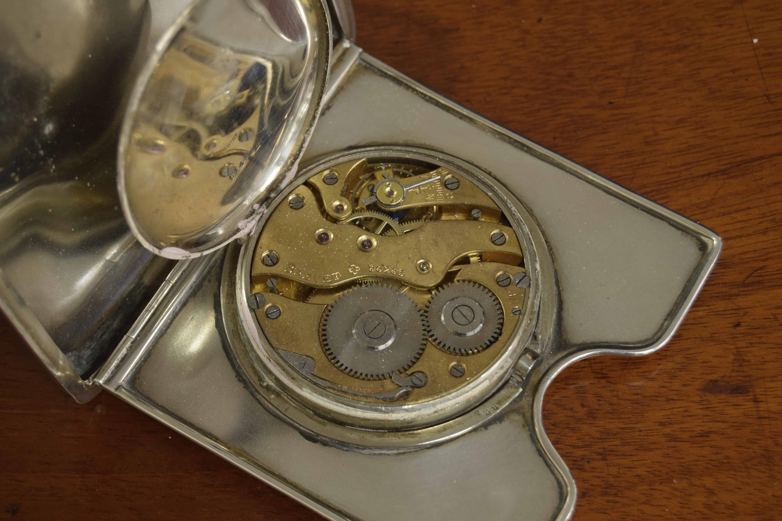 George V folding silver cased travelling eight day clock, within an engine turned cigarette case, - Image 3 of 6