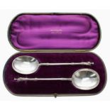 Pair of Walker & Hall apostle silver serving spoons, Sheffield 1937, 8.5" long, original branded