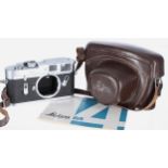 Leica M4 rangefinder camera, serial no. 1226820, silver body; also a Leica branded leather carry