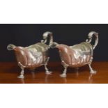 Good pair of George II Irish silver sauce boats, with leaf capped scroll handles, spiral fluted