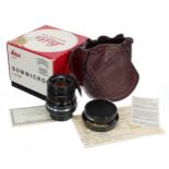 Leica Summicron 1.2/50 black camera lens, no. 2583722, in black, with hood, guarantee and