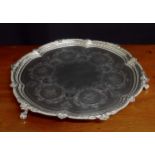 Impressive large Victorian lobed circular silver salver, with engraved foliate motif decoration