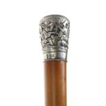 Chinese silver mounted walking cane, the silver pommel decorated in relief with figures and