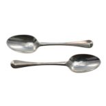 Pair of early 18th century Hanoverian pattern rat tail silver table spoons, maker 'GC', probably