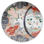 Chinese 19th century porcelain charger, decorated with panels of birds among trees divided by