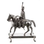 Late Victorian cast silver sculpture of a Royal Horse Guard, finely modelled mounted upon