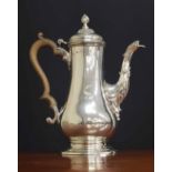 George III silver pear shaped coffee pot, with a fruitwood handle and hinged cover and a spiral