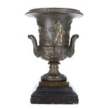 Good decorative bronze campagna urn, decorated with putti and fruiting vine, with twin rams head