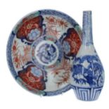 Japanese Imari palette plate, with a four character signature mark to the underside, 8.75" diameter;