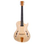 Good quality hand made electric archtop guitar; Back and sides: mahogany; Top: carved spruce top;