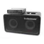 TC Electronic Classic 450 Class D bass guitar amplifier head; together with a TC Electronic RS210