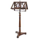 Victorian rosewood duet adjustable music stand, the two lyre ledges fitted with brass candle scones,