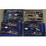 Three ex-student Buffet Crampon & Cie clarinets; also a contemporary unnamed clarinet, one without