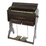 Late Victorian/Edwardian portable harmonium inscribed J.M. Hay, Sterling, upon foliate inlaid cheval