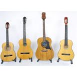 Four guitars to include a Russian nylon string, a WM steel string and two others, all in various