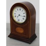 Inlaid mahogany arch-top mantel clock, the 3.5" enamelled dial over an inlaid shell paterae, the