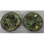 Pair of Portuguese Manuel Mafra for Caldas majolica pottery 'Palissy' style plates, featuring