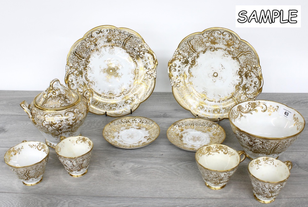 English 19th century porcelain tea service, decorated with gilt highlights comprising nine teacups