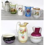 Selection of antique and later pottery water jugs, decorated with flowers, geometric borders,