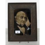 Sherwin & Cotton glazed pottery portrait plaque of William Gladstone by H.S Mendelssohn, with