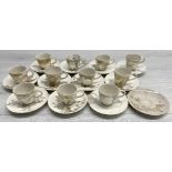 Selection of Japanese satsuma coffee cups and saucers, finely decorated with gilt highlighted floral