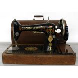 Singer oak cased sewing machine, serial no. Y1439274