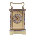 Attractive carriage clock timepiece, the 1.75" silvered chapter ring enclosing a filigree centre,