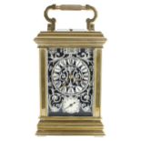 Repeater porcelain panelled carriage clock with alarm, the movement striking on a gong, the