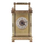 French carriage clock timepiece, the 1.75" silvered chapter ring enclosing a filigree centre and