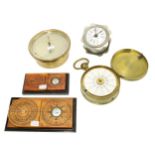 Brass cased aneroid barometer/thermometer, the 4" silvered dial inscribed no. 17586, surmounted by a